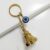 Gold Guardian Bell For Bike Keychain with Evil Eye Charm – Good Luck Motorcycle Bell for Riders | Protective Biker Gift for Men, Women, Friends & Loved Ones | (Shiny Golden with Evil Eye)